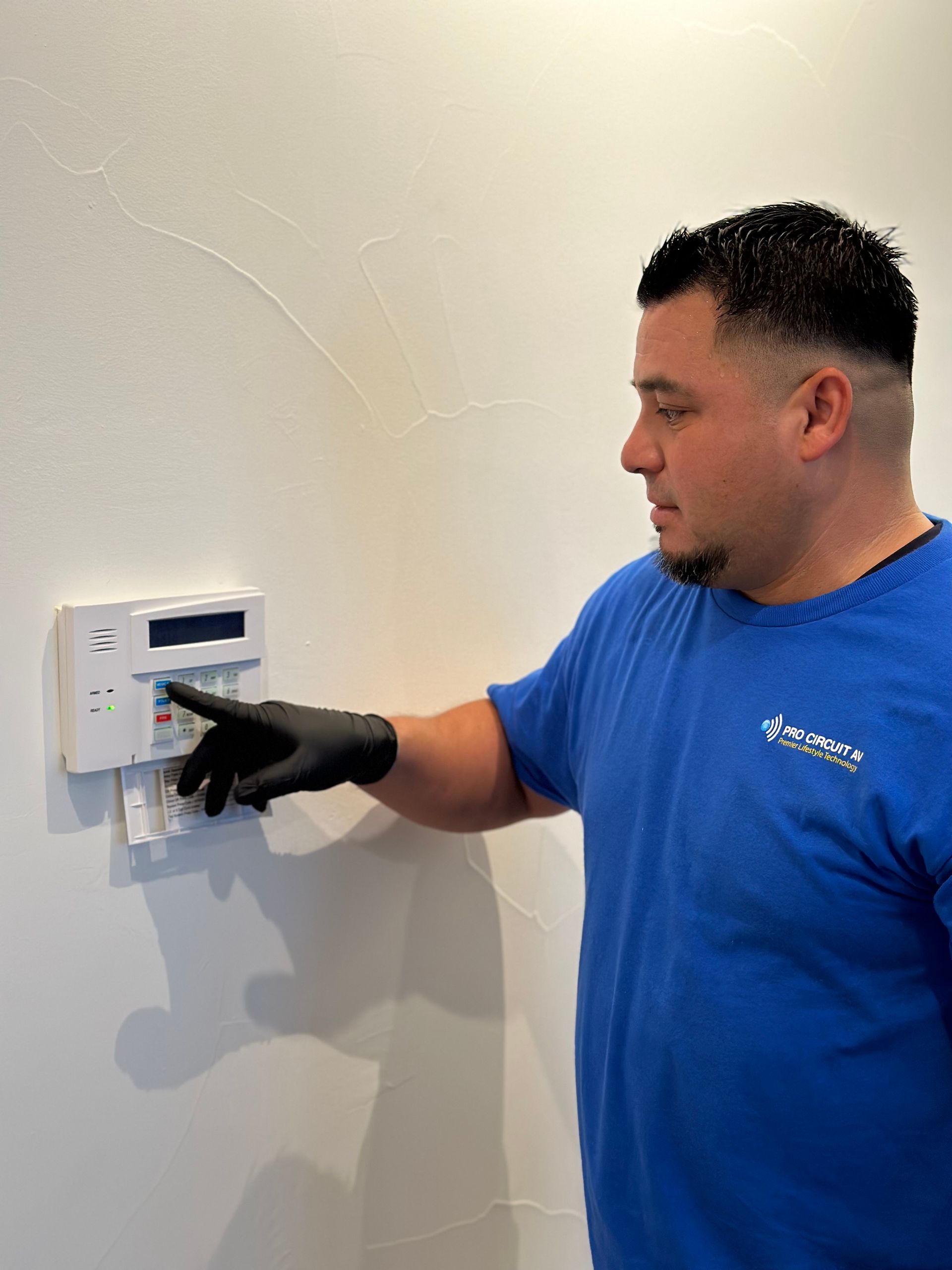 Worker showing security system