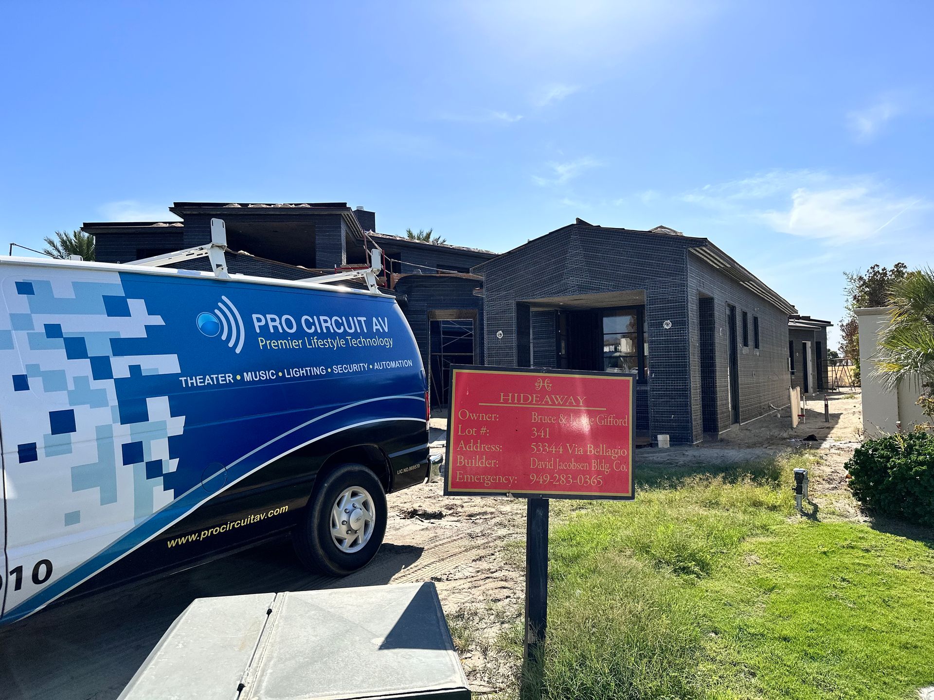 Company vehicle in front of house