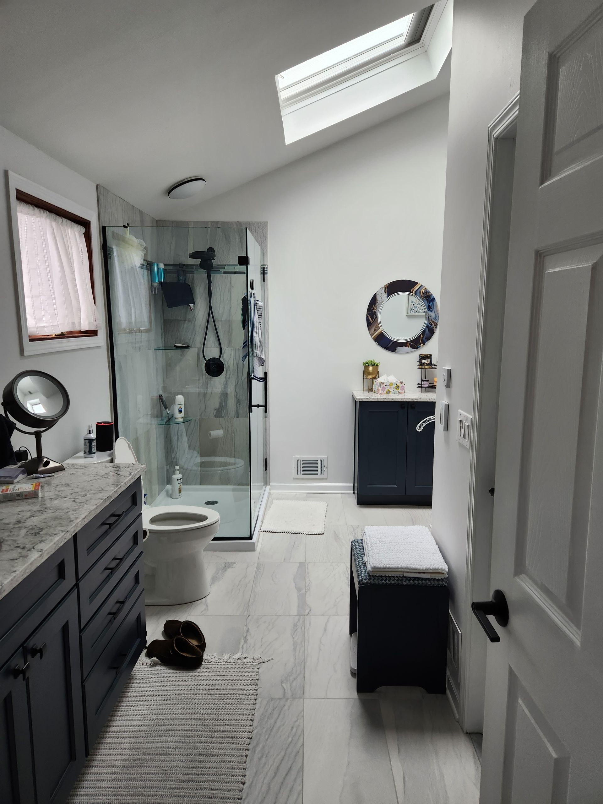 remodeled bathroom with a walk-in shower