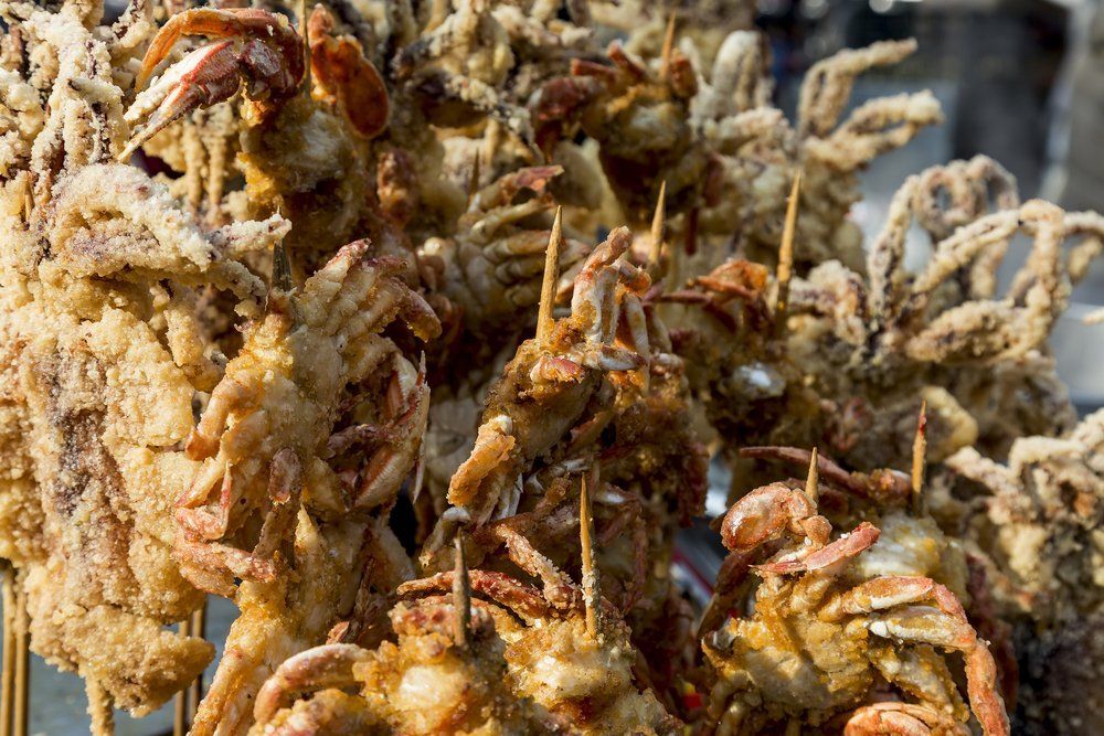 Fried crab for sale at the street market in the Muslim district of Xi'an, China