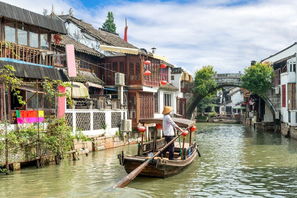 China traditional tourist boats on canals of Shanghai Zhujiajiao Water Town in Shanghai, China