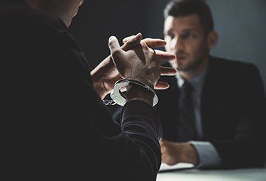 Criminal Law — Man in Handcuffs in Auburn, CA