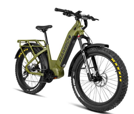 Green Rambo electric fat bike with black tires, cargo rack, and front suspension.