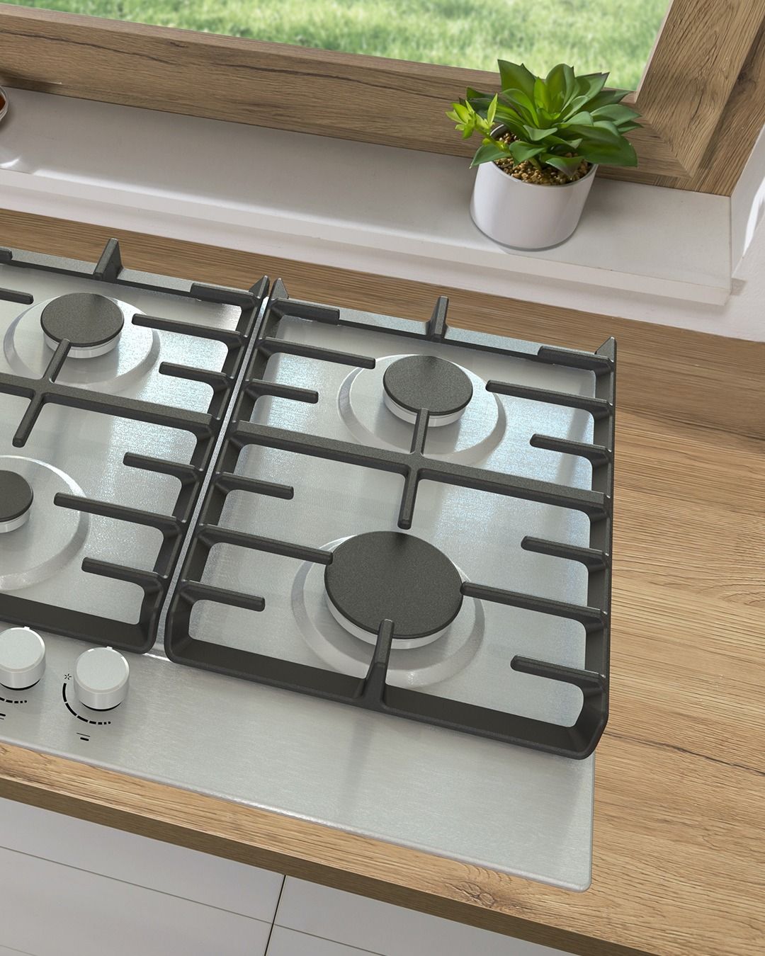 Um fogão com fogão está sobre um balcão de madeira próximo a uma janela.