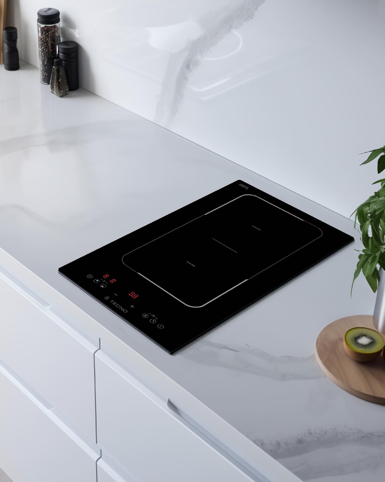 Um fogão preto está em cima de um balcão branco.