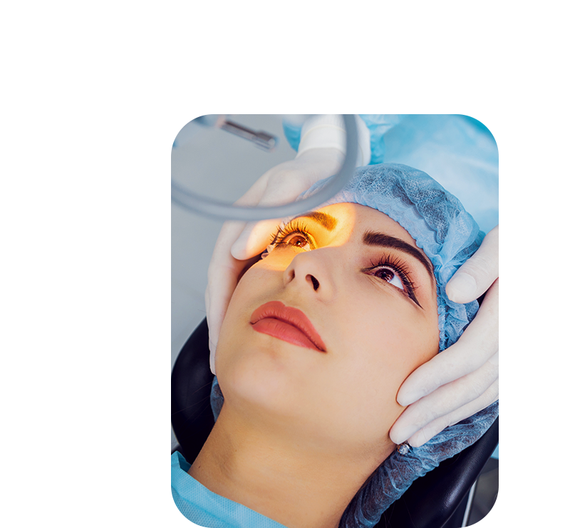 A woman is getting her eyes examined by a surgeon