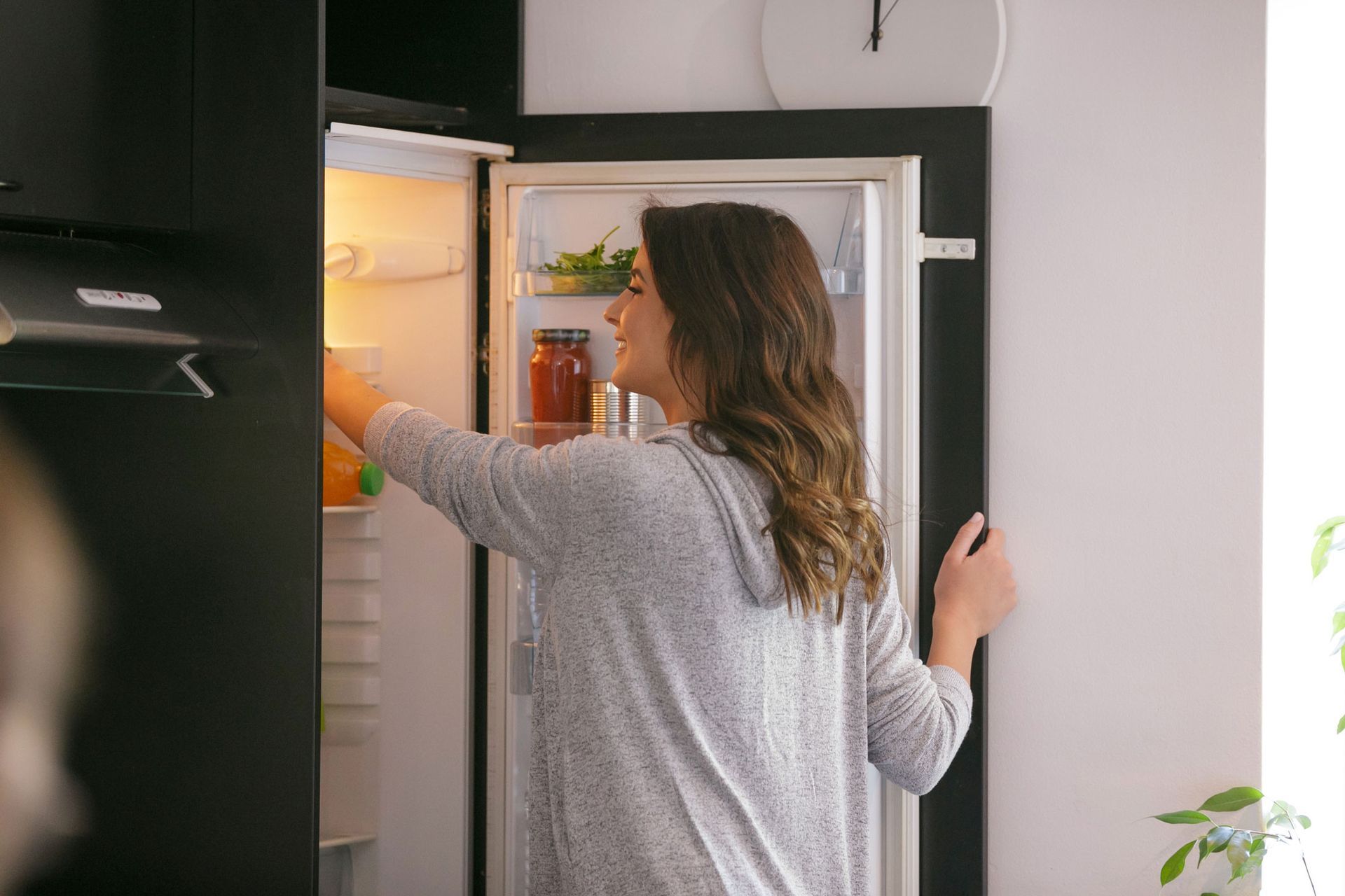 Happy Woman Taking Food from the Fridge — Geelong, VIC — Cool Cats Refrigeration