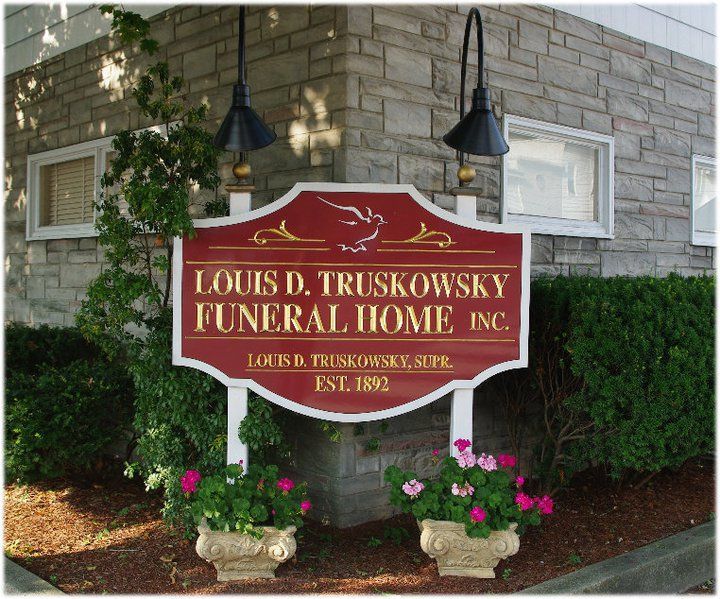 A large office building with a lot of windows on a sunny day.