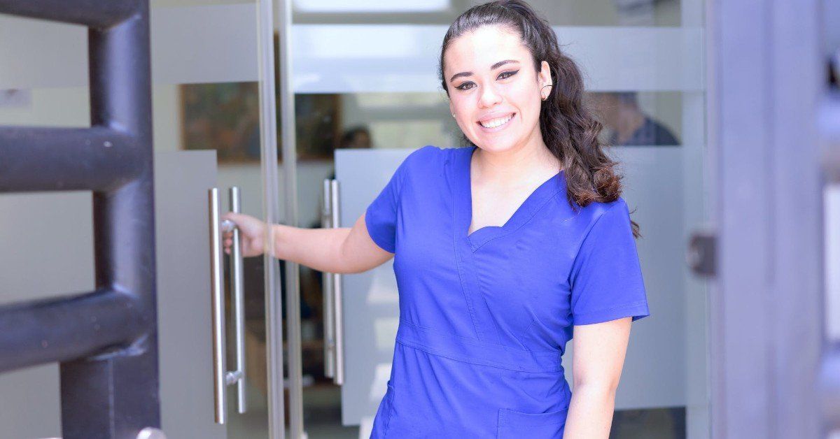 Nurse standing at gate