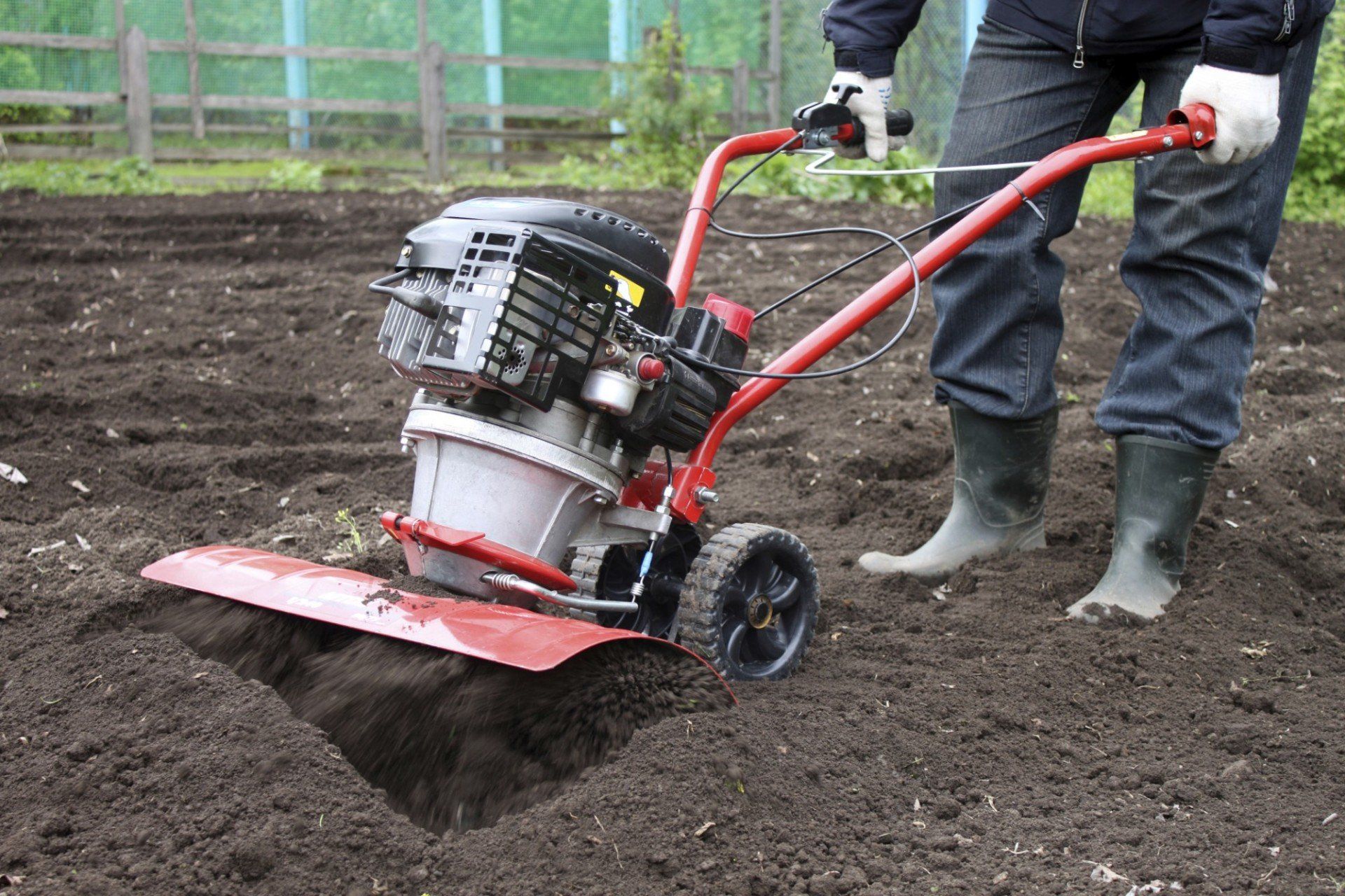 tilling dirt with machine