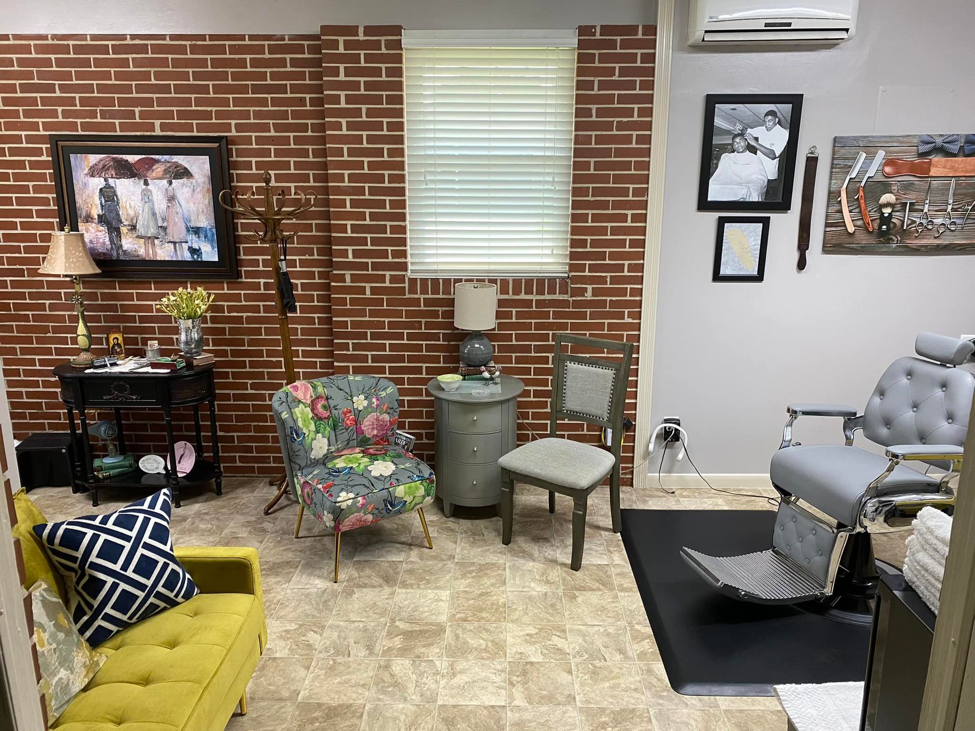 There is a barber chair in the middle of the room.