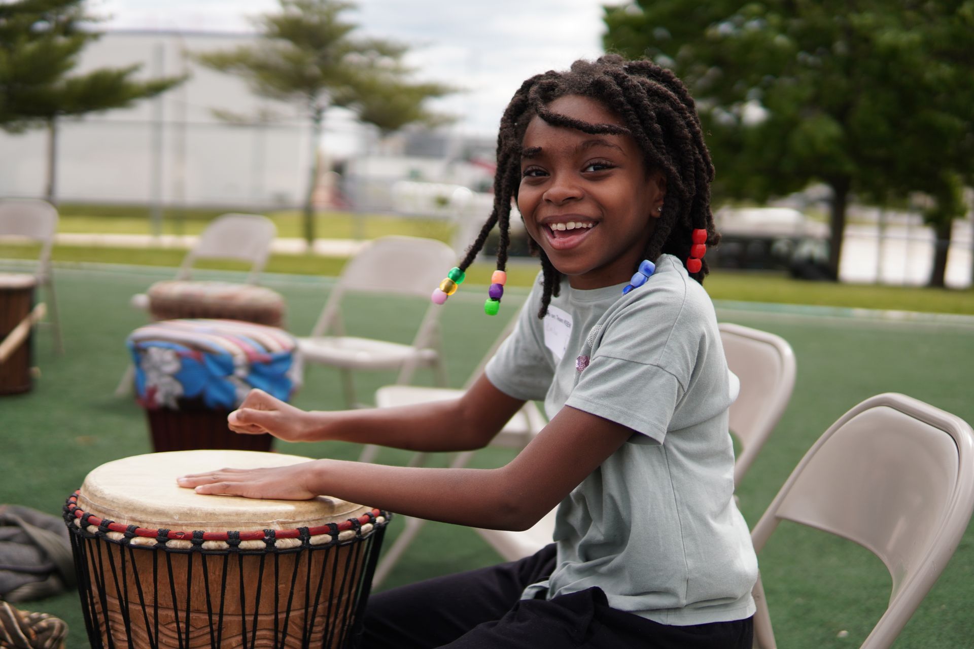 Girl plays drums