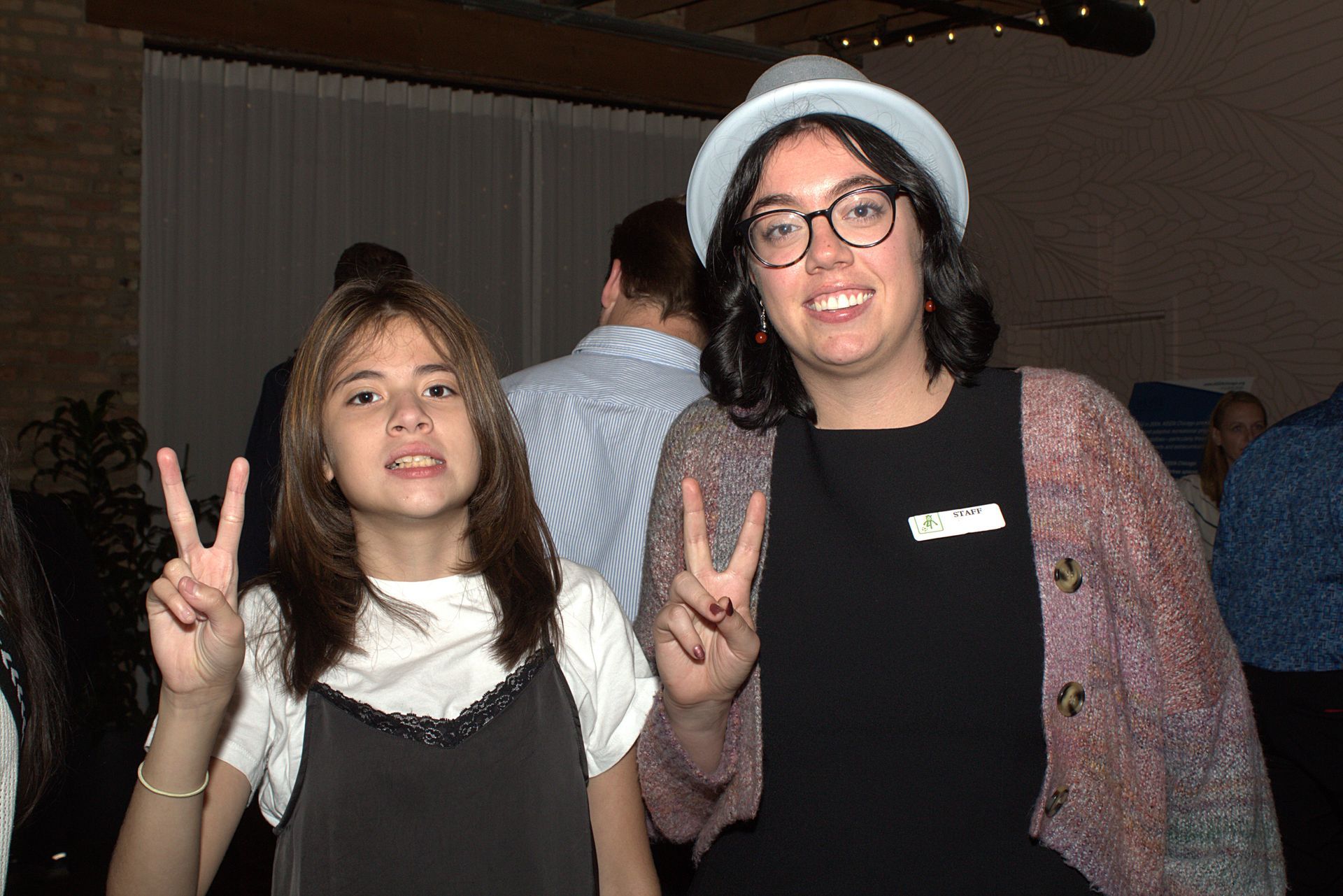 KEEN Chicago staff, Grayson, and an athlete pose for the camera