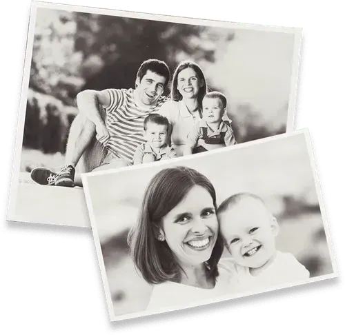 A black and white photo of a family posing for a picture