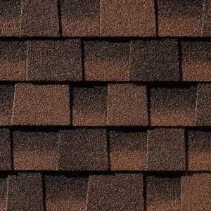 Brown and tan asphalt roof shingles, close-up view.