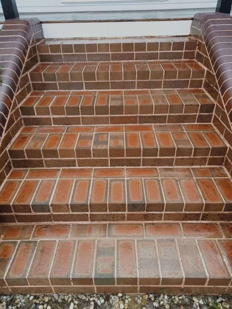 Woman Cleaning the Window with Steam — Highlands Window Cleaning in Mittagong, NSW