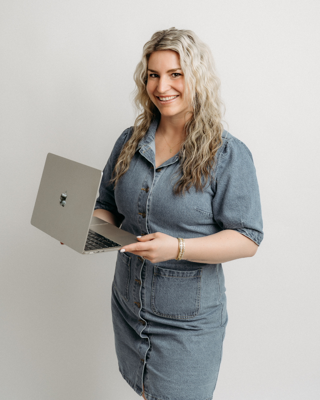 Founder of social media agency posing for a headshot
