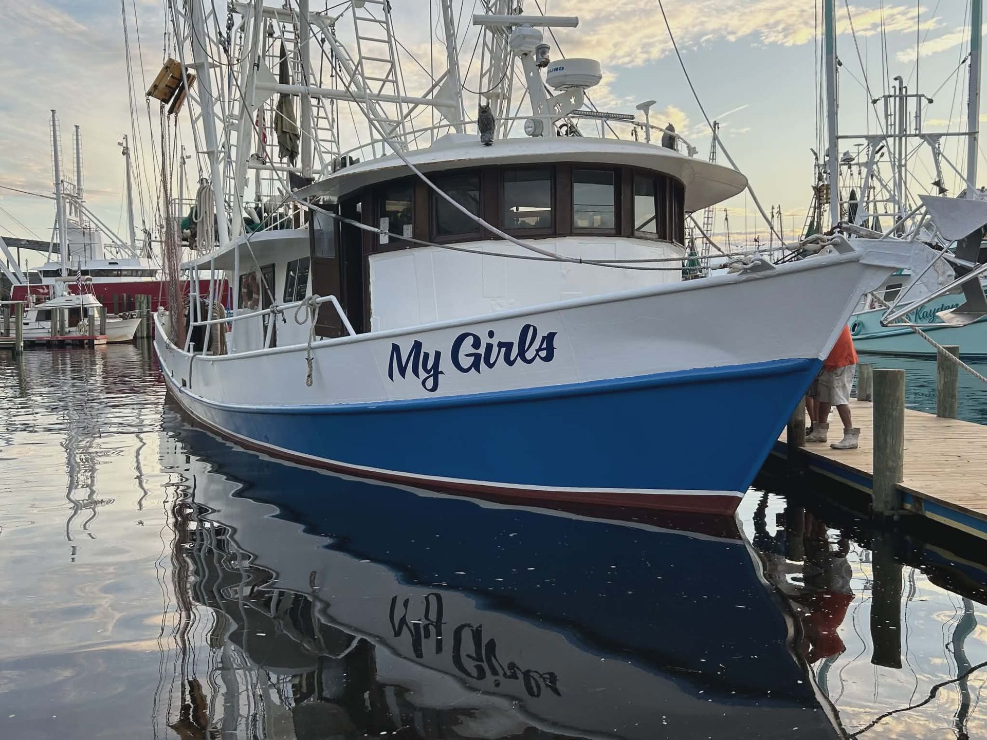 White and blue boat named 