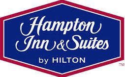 Hampton Inn & Suites logo: Blue hexagonal shape with white cursive text, red outline, and 