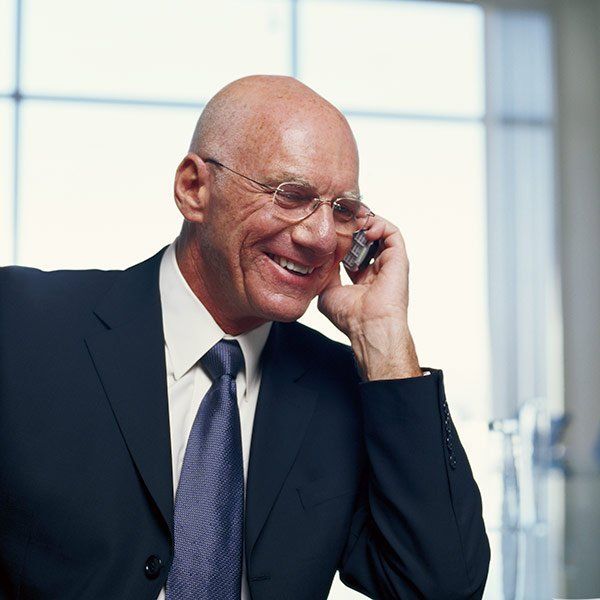 what to expect at a funeral man talking on phone