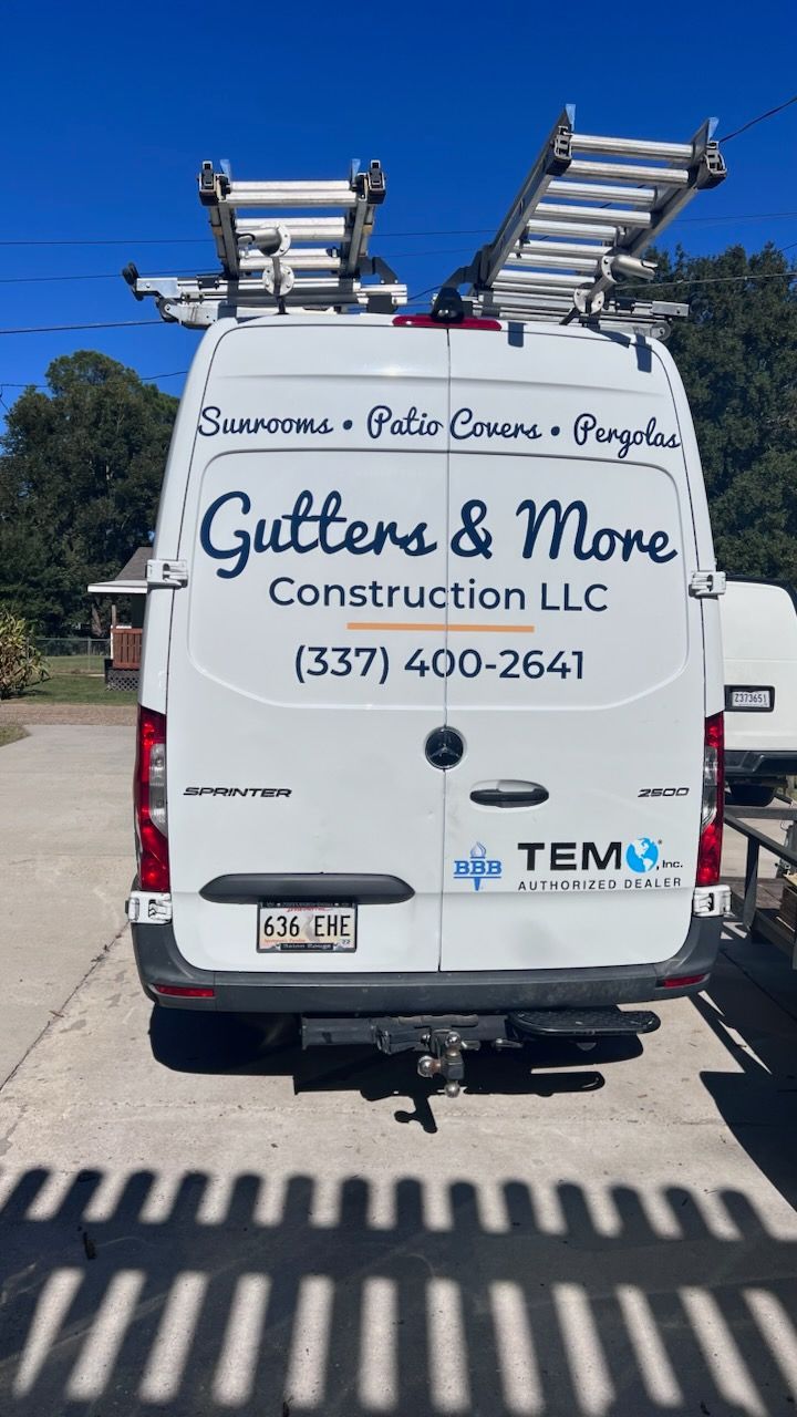 White van with ladders,