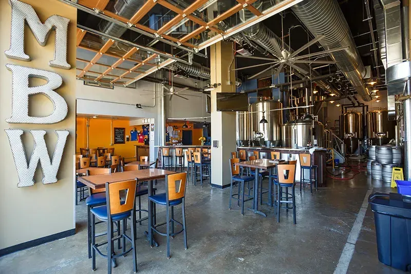 Municipal Brew Works interior with bar seating and industrial-style design