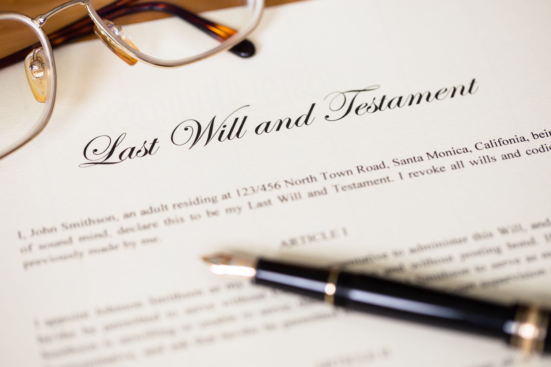 Last will and testament with pen and glasses. Last will and testament with pen and glasses.