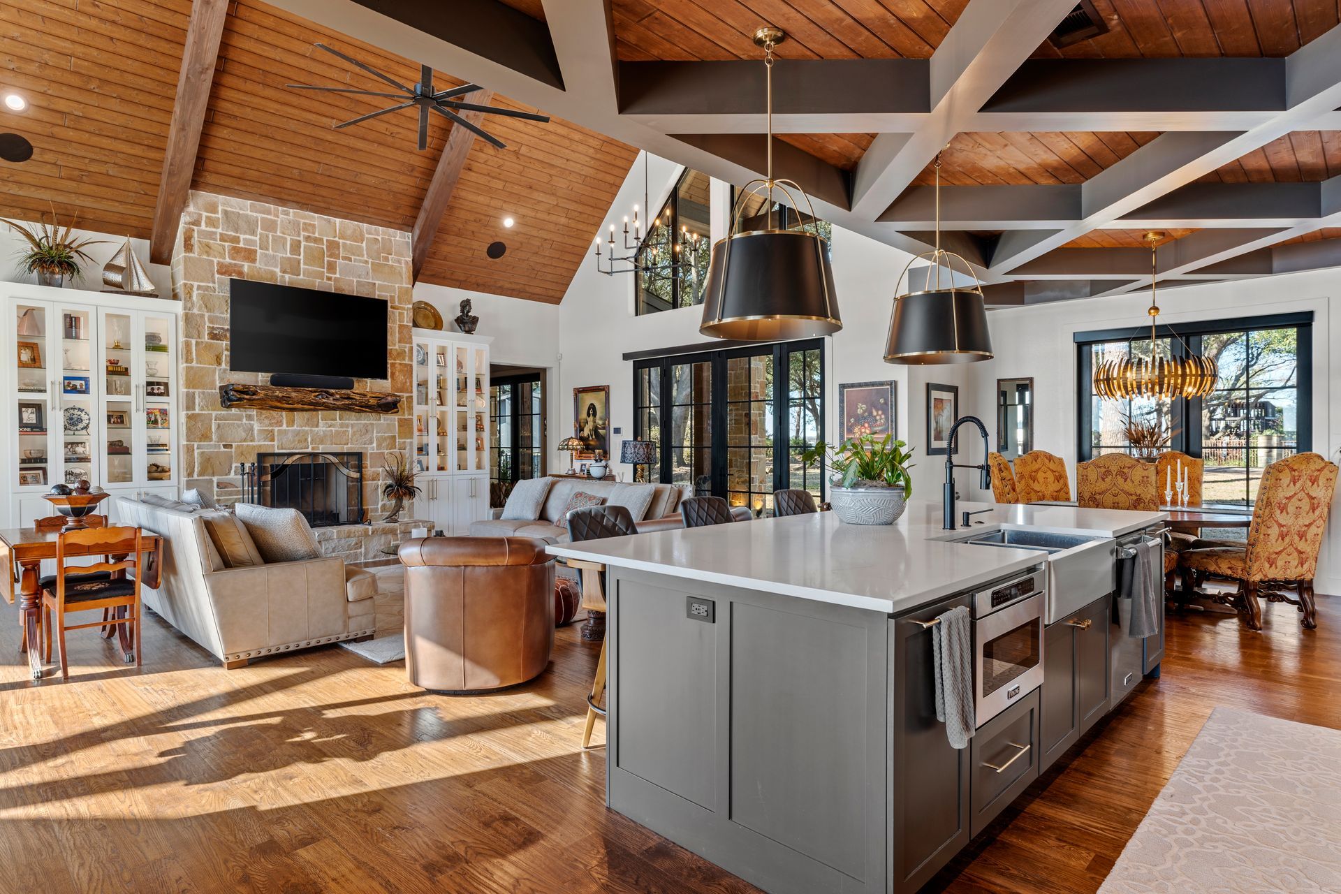 A large kitchen with a large island in the middle of the room.