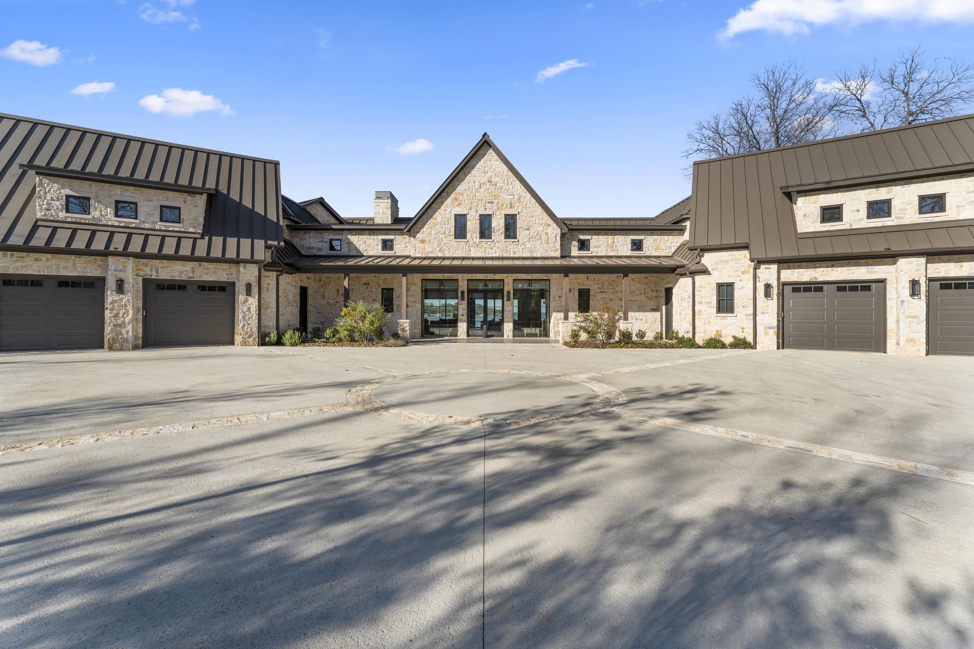 A large house with a lot of garages is for sale.