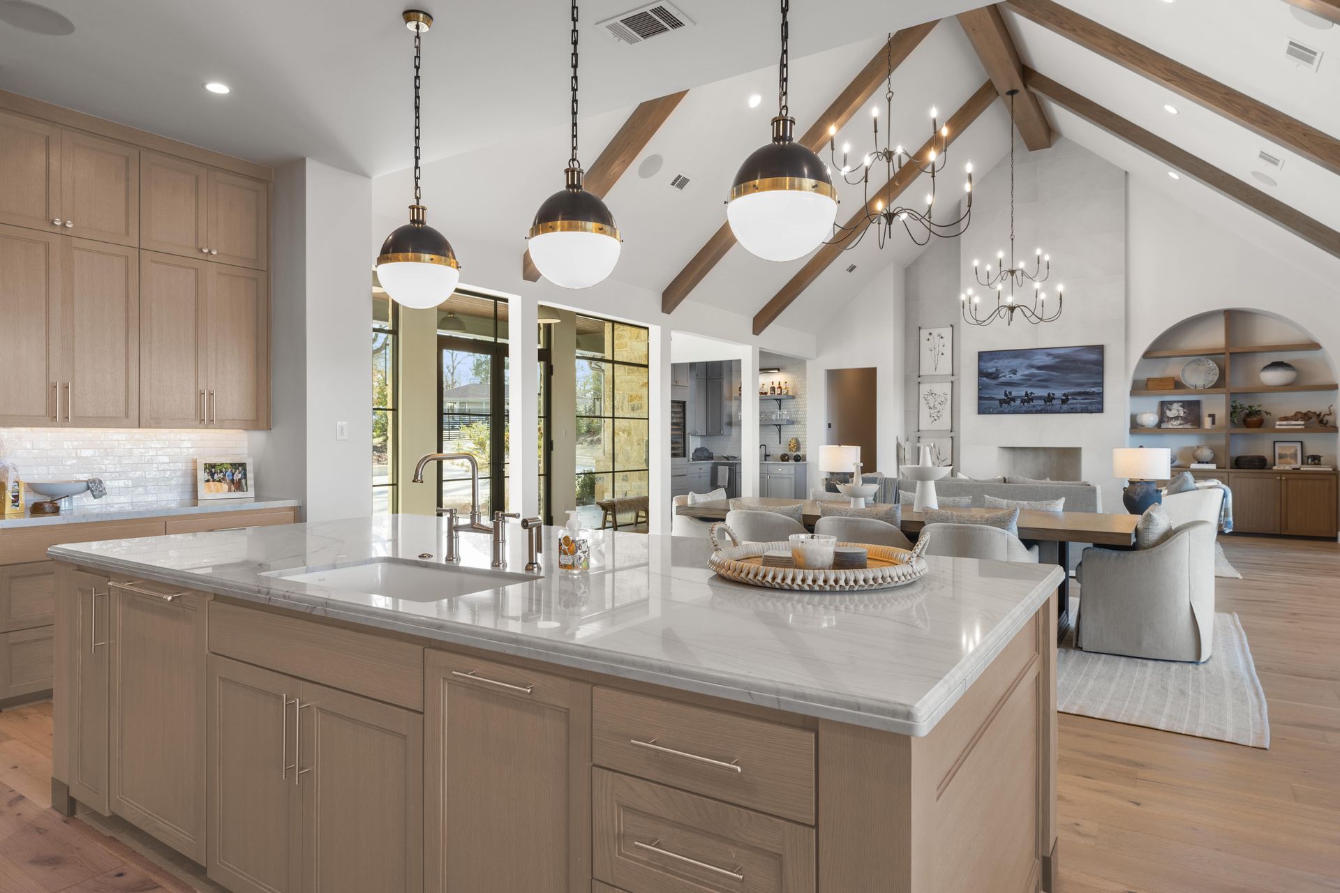 There is a large island in the middle of the kitchen.