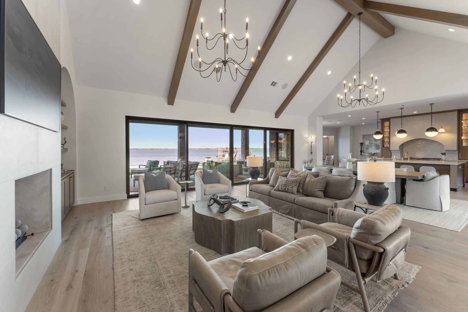 A living room with a lot of furniture and a fireplace