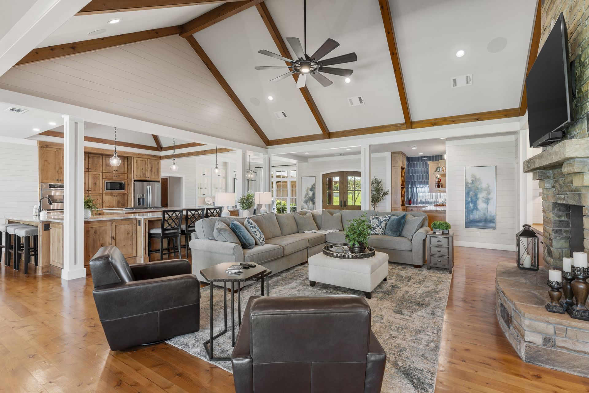 A living room filled with furniture and a fireplace.