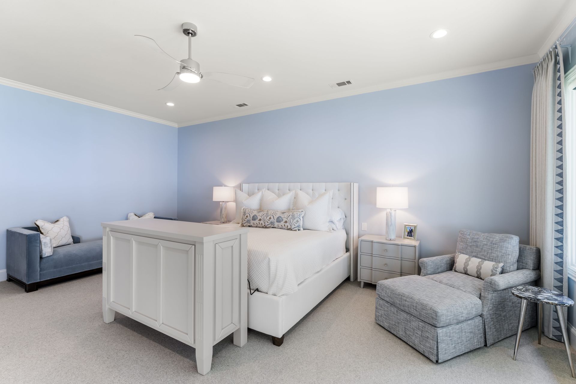 There is a large bed in the middle of the room.