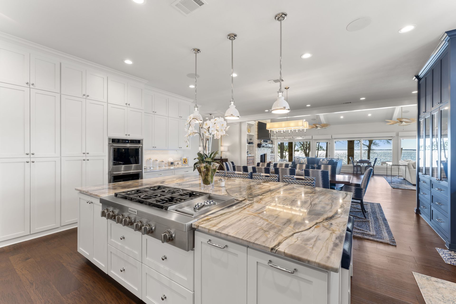 There is a large island in the middle of the kitchen.