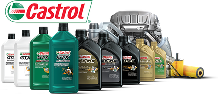 A group of bottles of castrol oil are lined up next to each other.