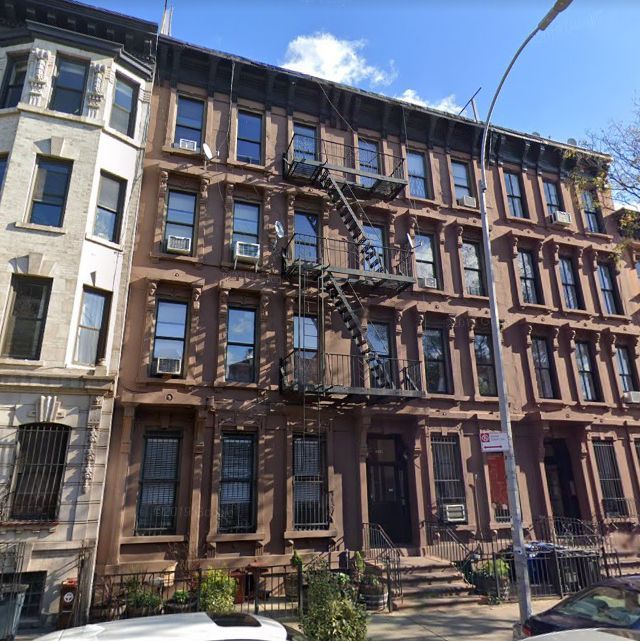 A building with a fire escape on the side of it