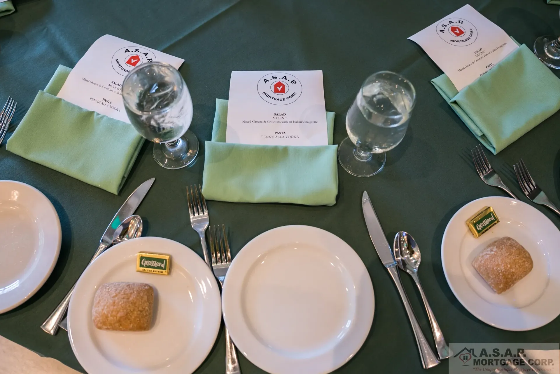 A table set for a dinner with plates and silverware