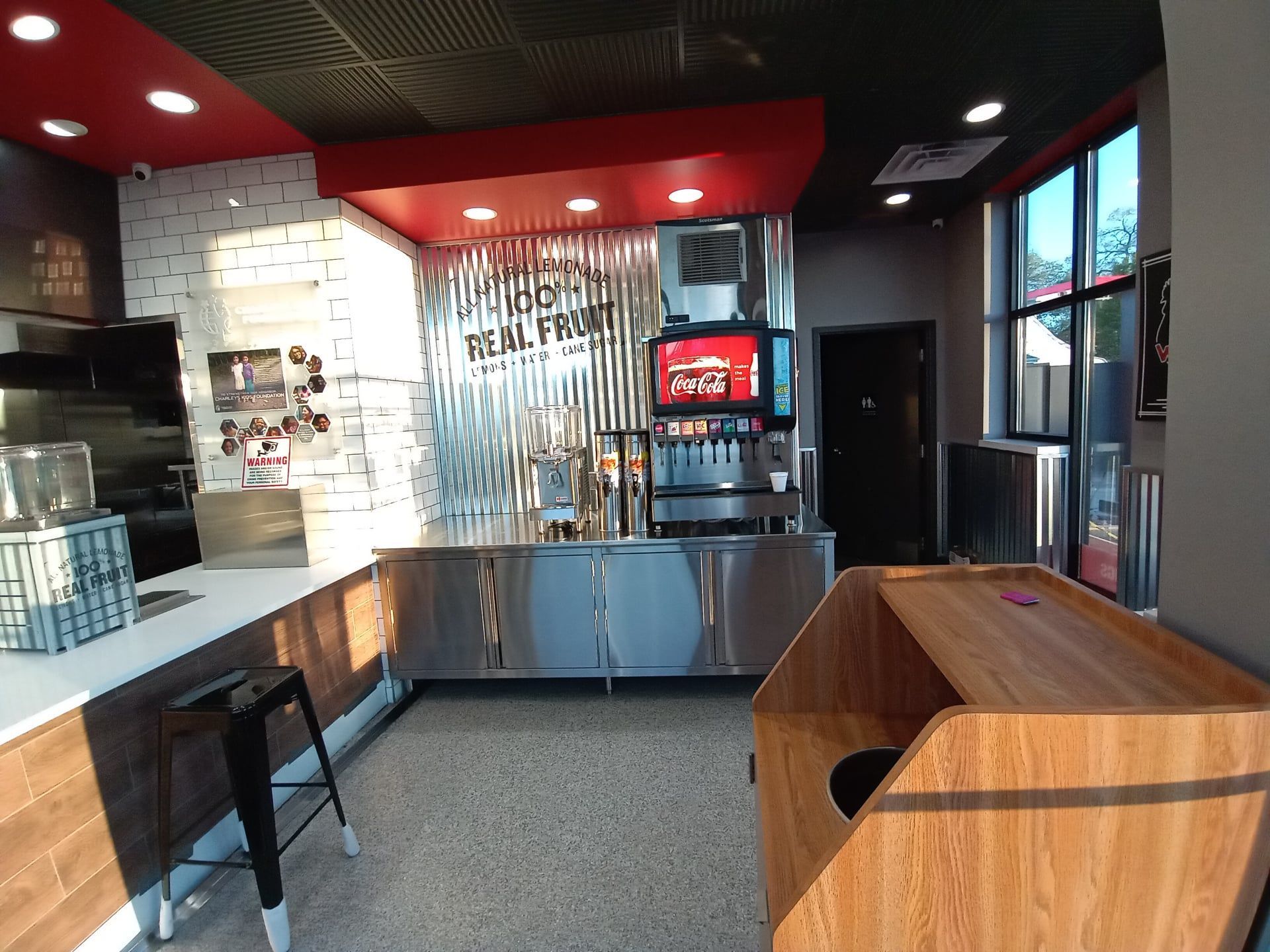 A counter in a restaurant with a sign that says ' seafood ' on it