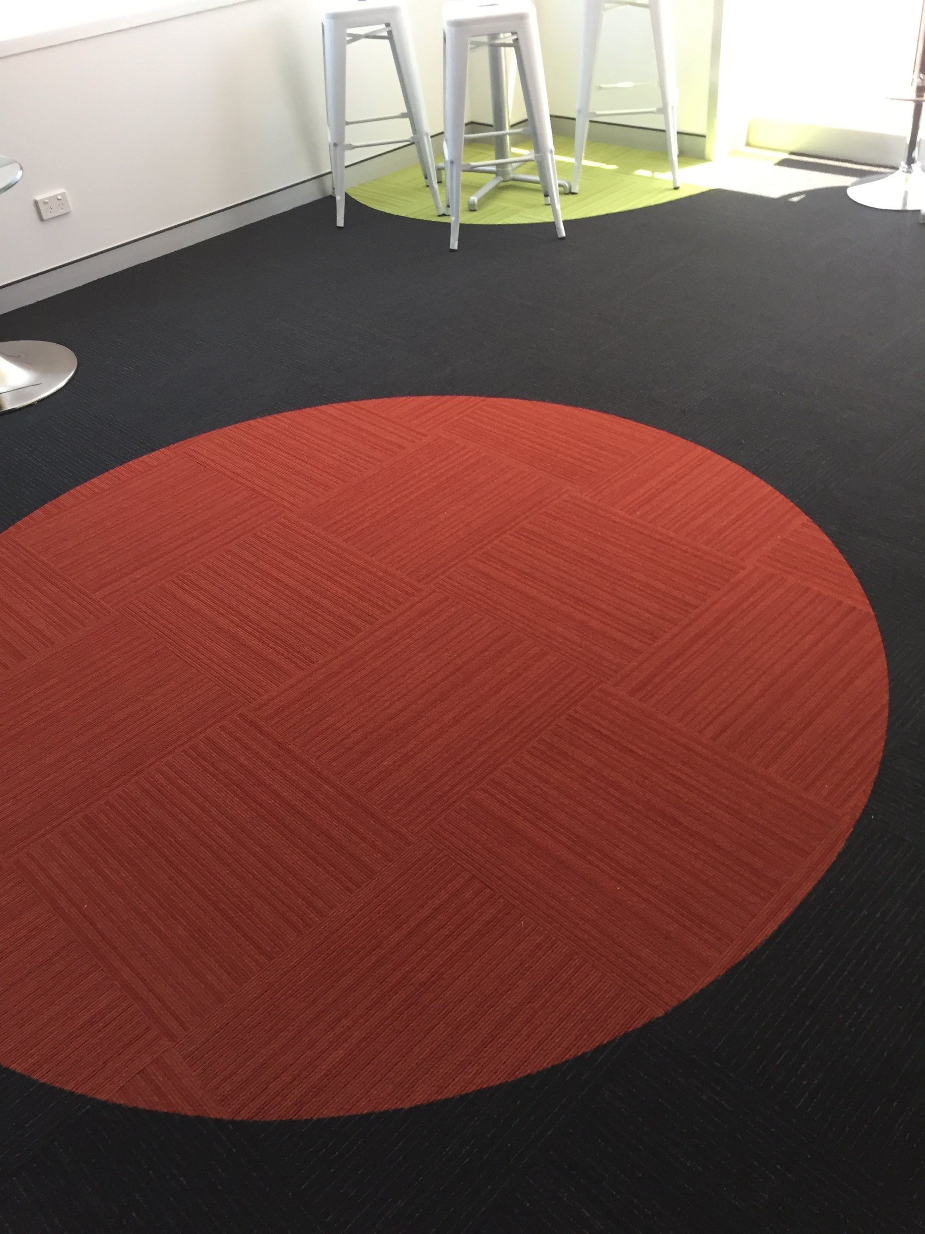 round red carpet black flooring