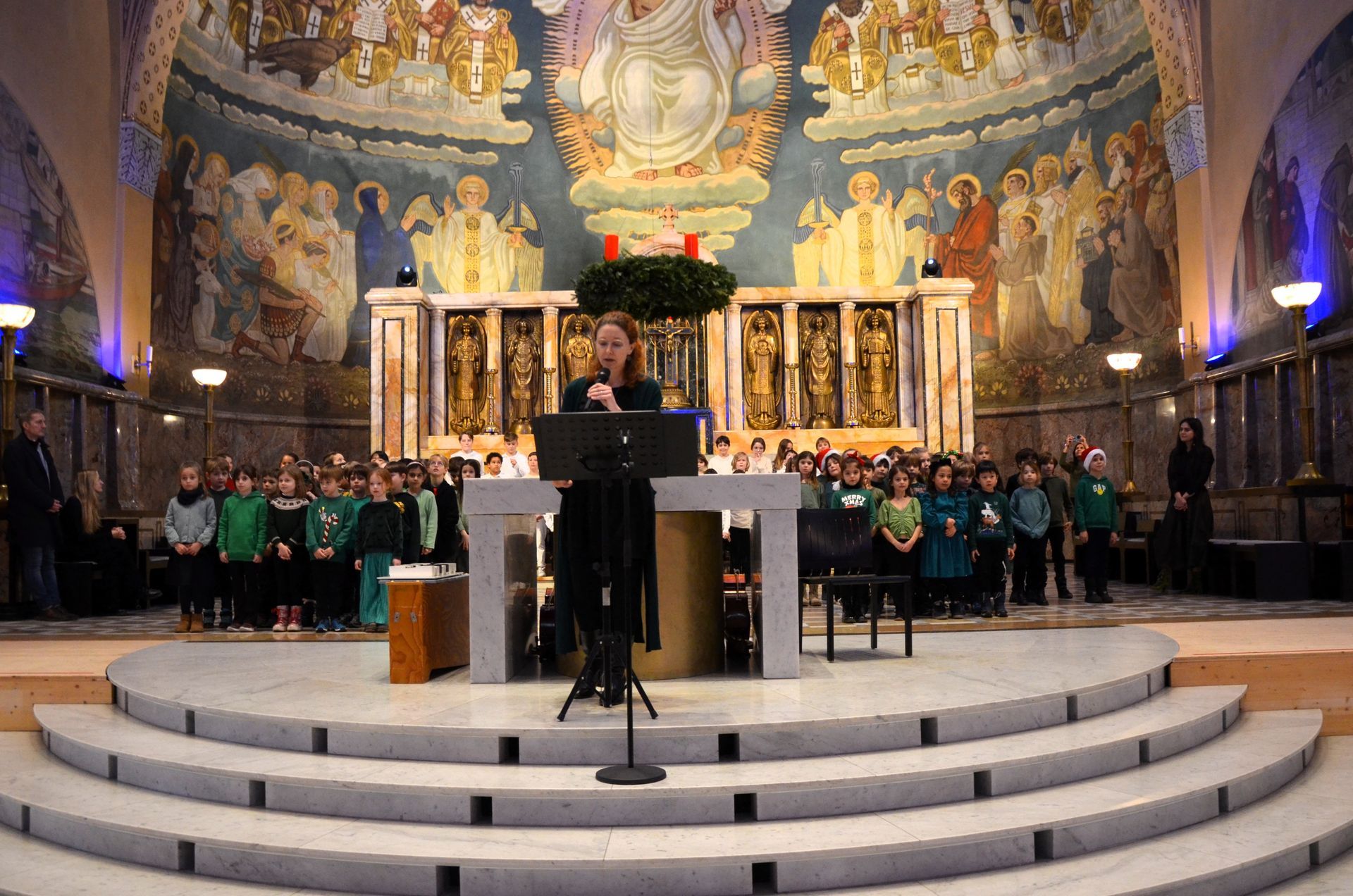 A poster for a concert in zurich shows a woman holding a violin.