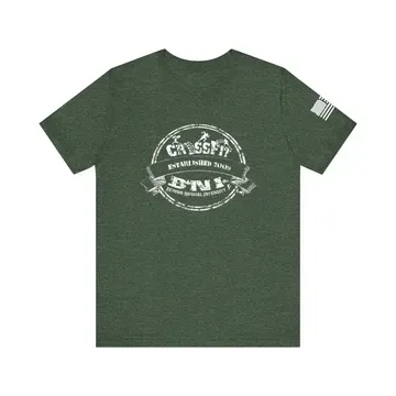A green t-shirt with the CrossFit BNI logo on it
