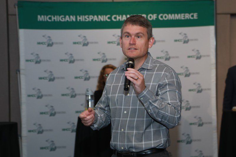 Man Speaking in Front — Ferndale, MI — Michigan Hispanic Chamber of Commerce