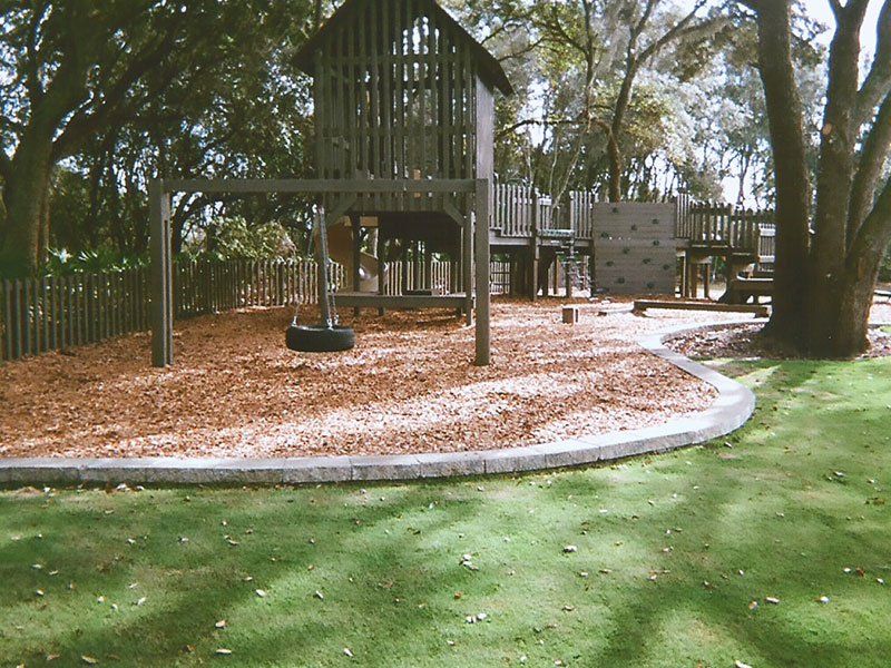 Wooden Playground with Tire Swing — Clermont, FL — Florida Dock & Boat Lifts