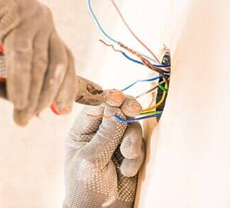 Worker Installing Electrical Wires — Electrical Service Upgrades in Saint Paul, MN