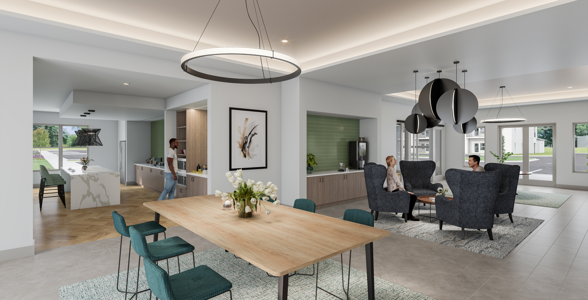 Interior of a modern lounge area with seating, dining table, and kitchen space. People are present.