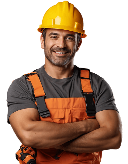 Construction worker with arms crossed, wearing a yellow hard hat and orange overalls, smiling.