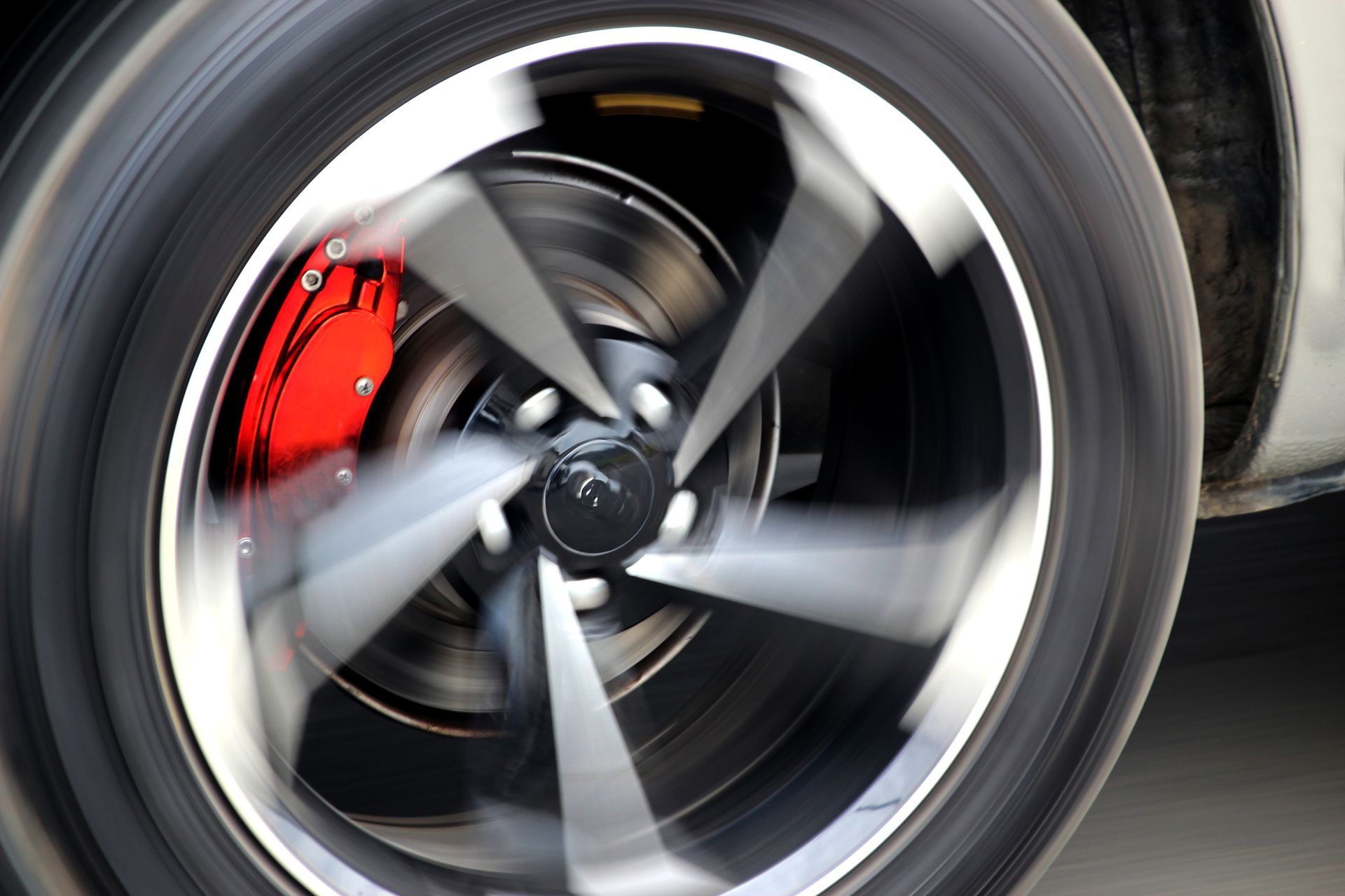 Car Wheel with a Red Brake Caliper — Anaheim, CA — Precision German