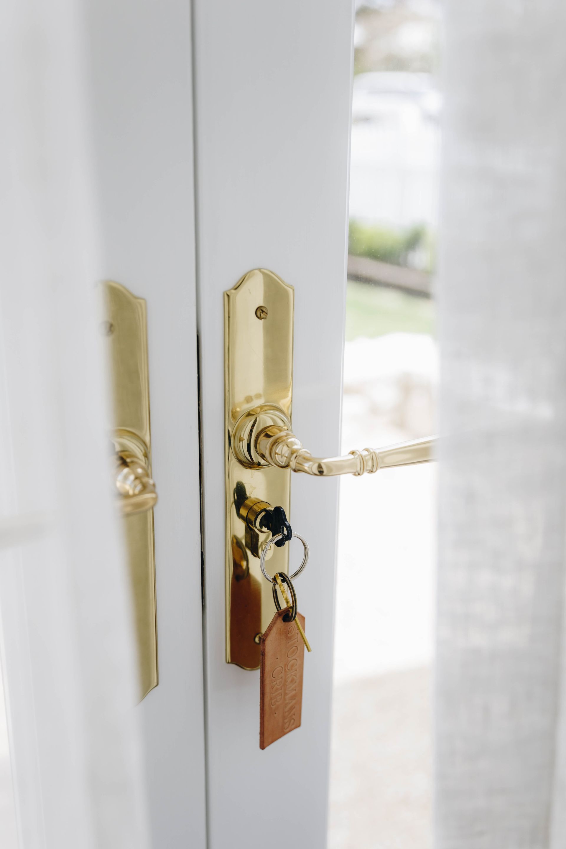 A Close Up Of A Door With A Key On It — Port Macquarie Locksmiths In Port Macquarie, NSW
