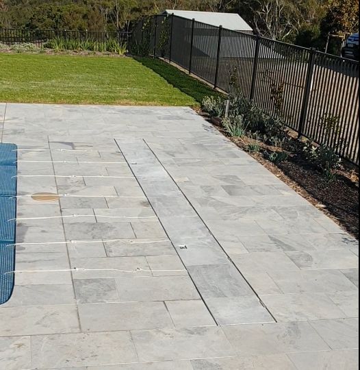 A Patio With A Fence And A Lawn In The Background — Aussie UnderCover In Sydney, NSW