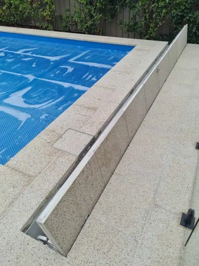 A Swimming Pool With A Blue Cover On It — Aussie UnderCover In South Nowra, NSW